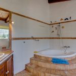 Jacaranda Bathroom with corner bath.jpg